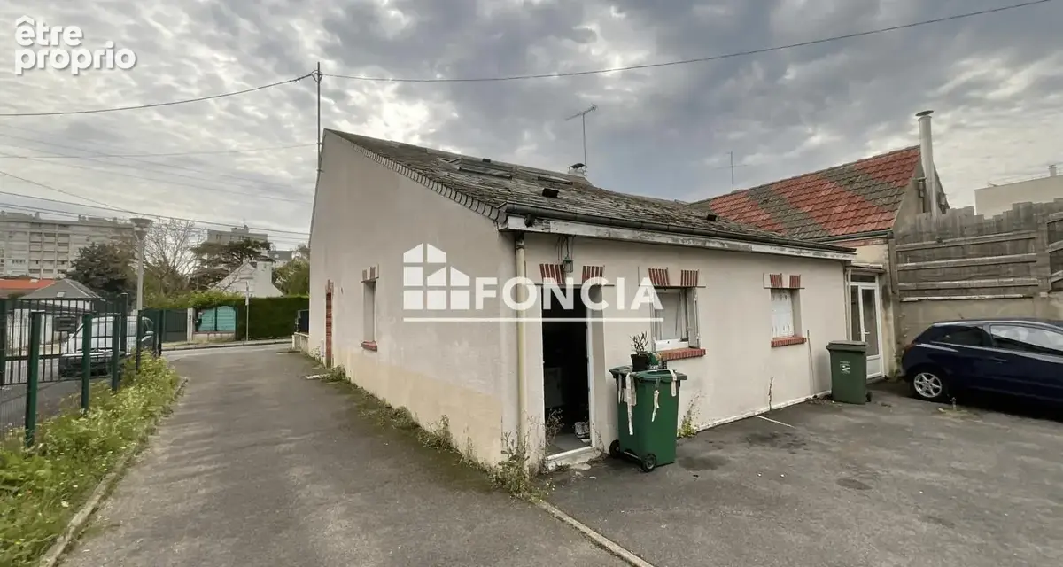 Ensemble immobilier de 3 appartements et de 3 stationnements - photo 8
