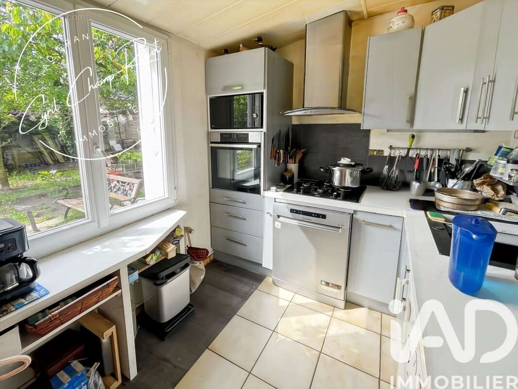 Photo 2 - Maison à TREMBLAY-EN-FRANCE