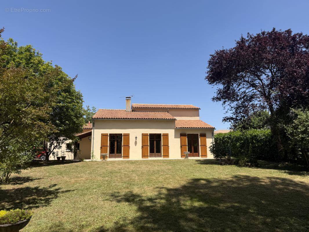Maison 4 chambres et double garage - photo 1