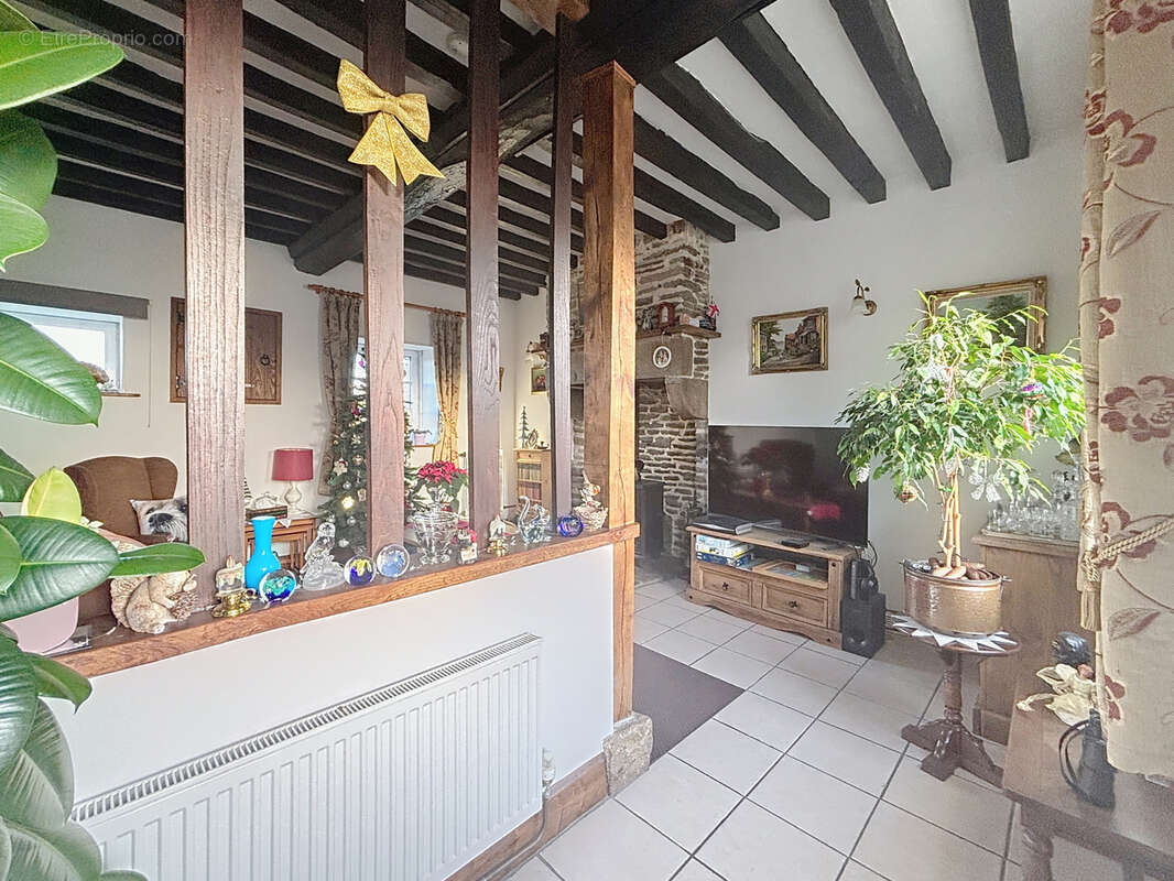 Maison à JUVIGNY-LE-TERTRE