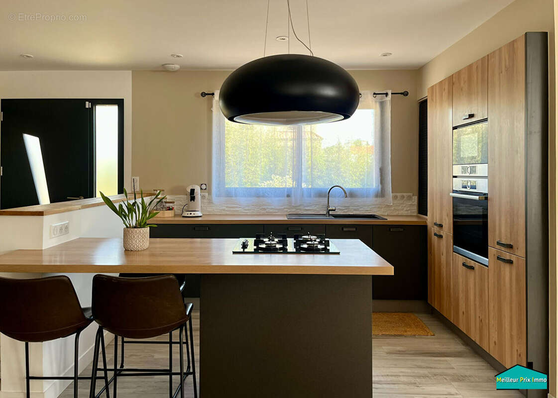 Maison aux excellentes prestations, avec 3 chambres et garage double ! - photo 3
