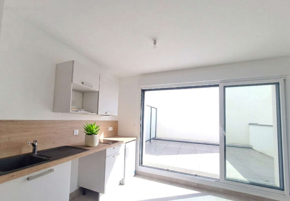 Appartement T1 - 2023 - 35.80 m2 - Terrasse - Parking + Cave + Local à vélos - photo 2