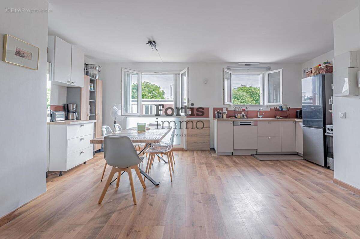 Saint-denis - appartement rénové avec balcon plein sud - photo 3