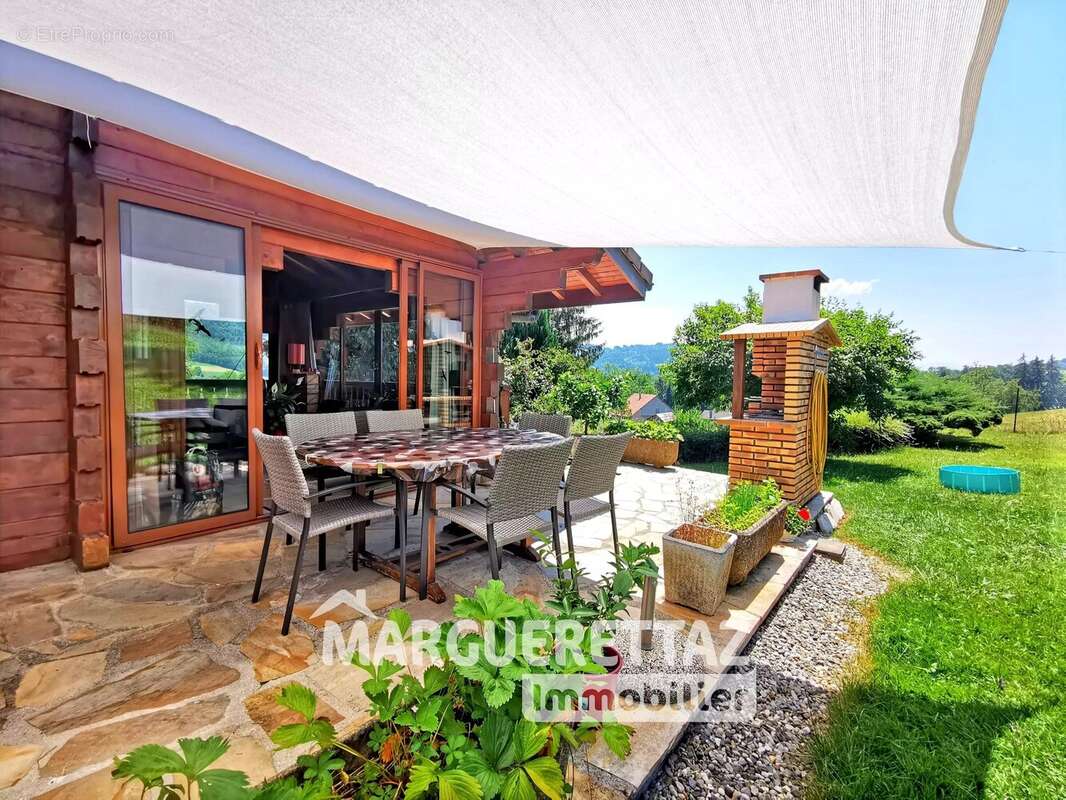 Chalet - vue dégagée - calme - 164 m² habitables - 2705 m² de terrain clôturé - Cœur de Boëge ! - photo 11