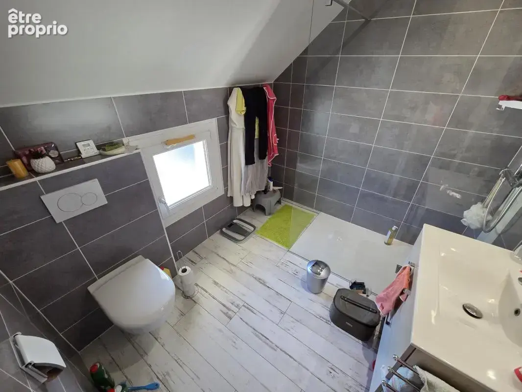 Ensemble immobilier 3 logements-parking- centre bourg neulli - photo 6
