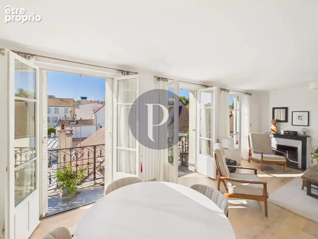 La surprise sous les toits : duplex style loft exceptionnel. - photo 2