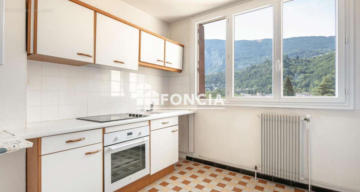 MEYLAN, Secteur Ayguinards, T3 de 56 m2 au 4ème étage avec balcon - photo 6