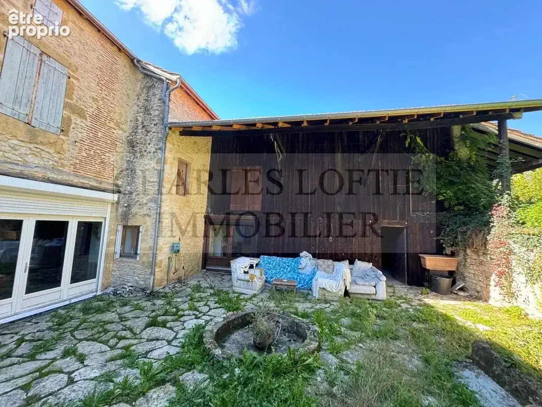 Charmante maison de village spacieuse en pierre avec superbe jardin et beau potentiel. - photo 10