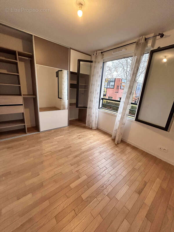 Photo 4 - Appartement à VOISINS-LE-BRETONNEUX