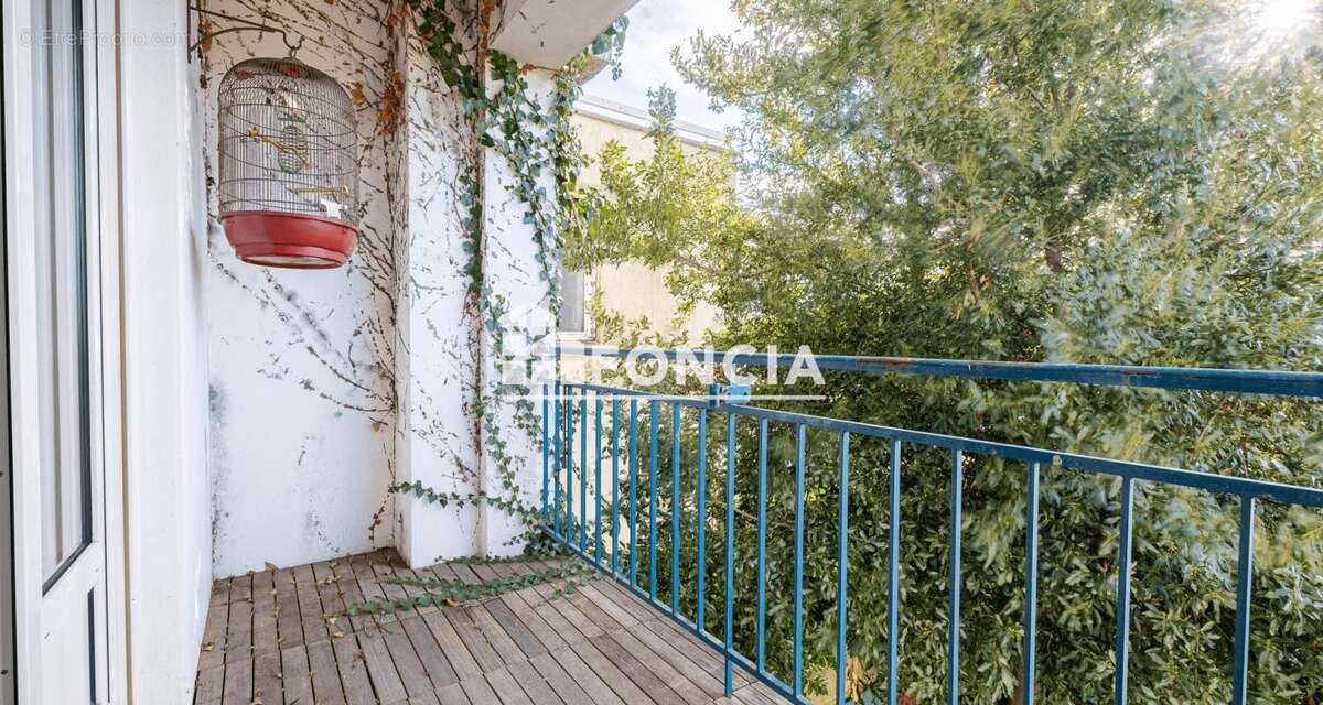 Centre ville - APPARTEMENT T3 avec balcon et caveau - photo 8