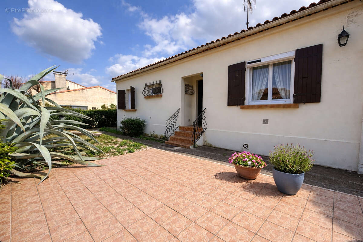 Maison de plain-pied - 93 m² - Terrain 407 m² - Environnement calme en impasse - photo 5