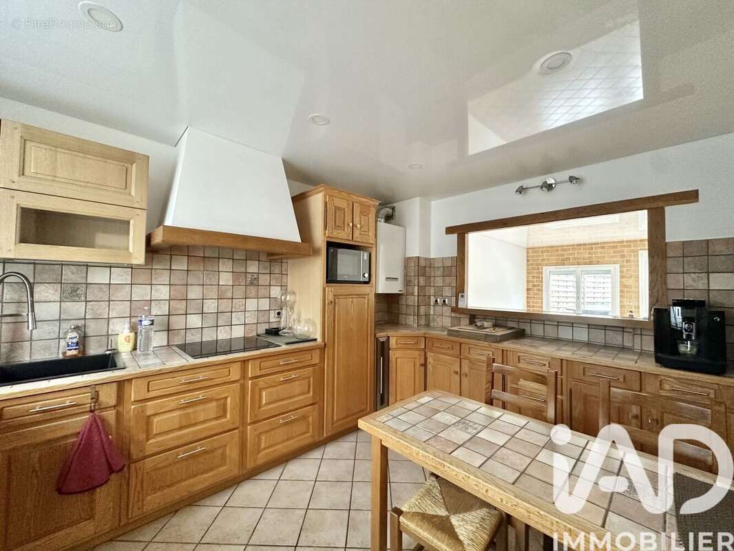 Photo 3 - Maison à SAVIGNY-LE-TEMPLE