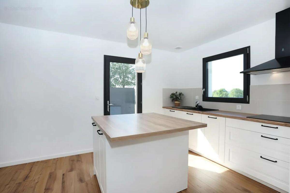 Maison de 5 pièces de 123 m² à La Bouëxière - photo 7