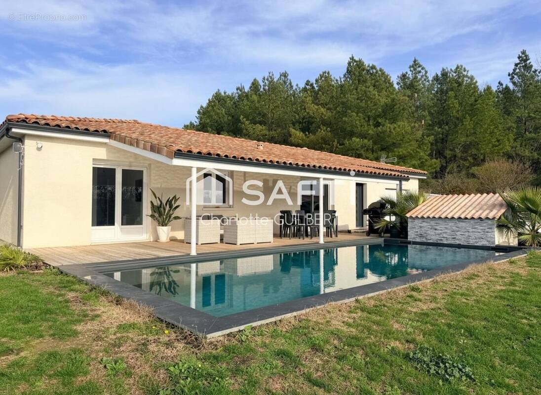 Photo 1 - Maison à POUSSIGNAC