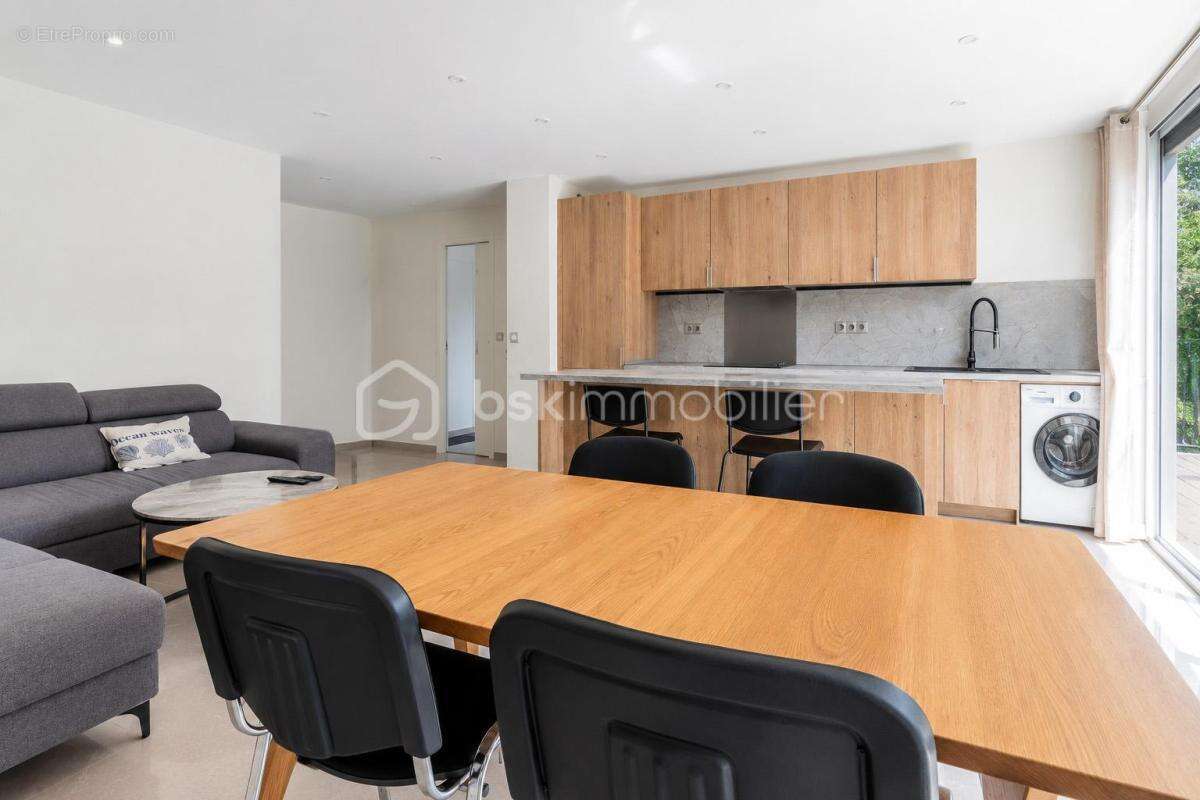Appartement T3 en rez-de jardin avec loggia - photo 3