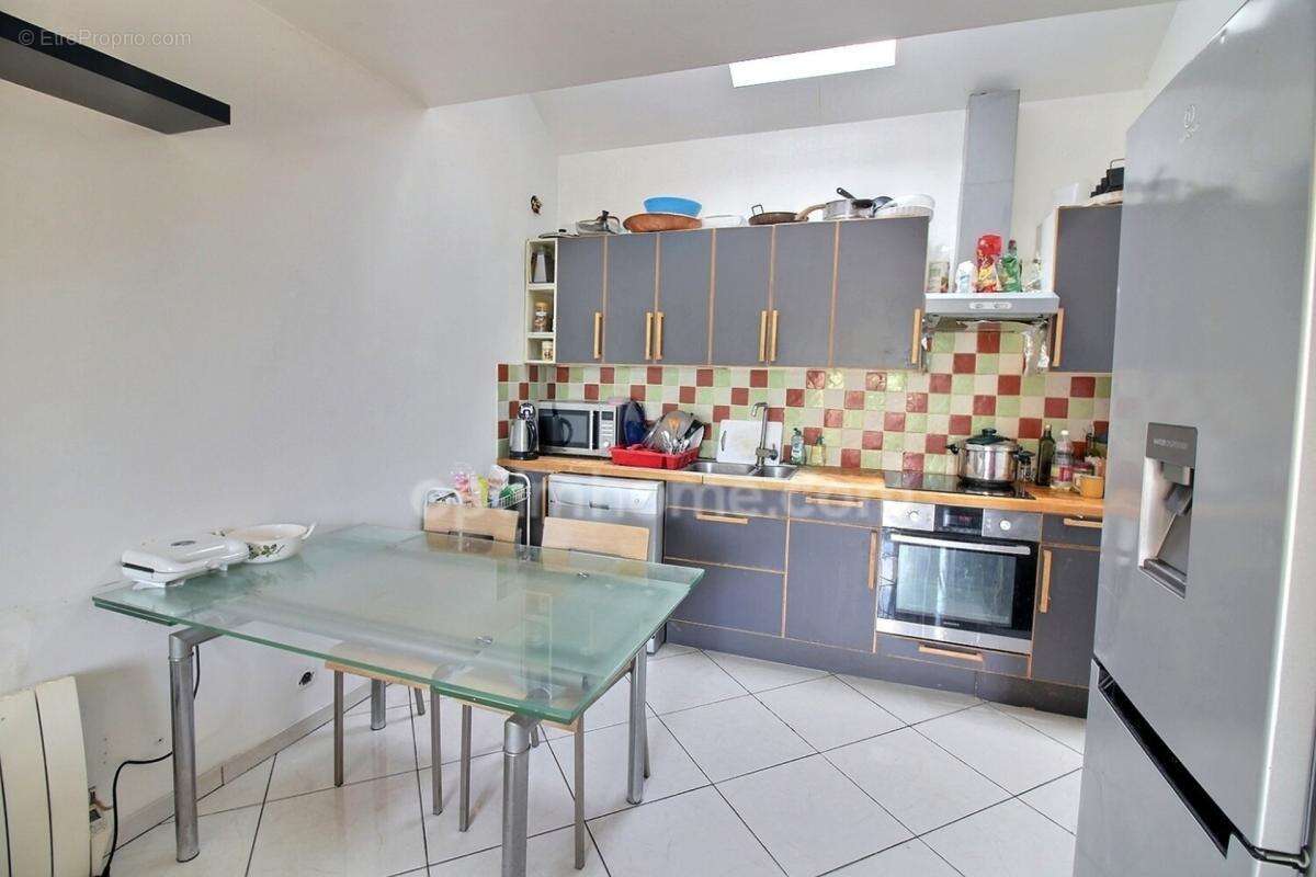 Appartement 3 pièces de 65 m2 en duplex + studio de 20 m2 avec parkings à vendre à CARRIERES SOUS POISSY (78) - photo 2