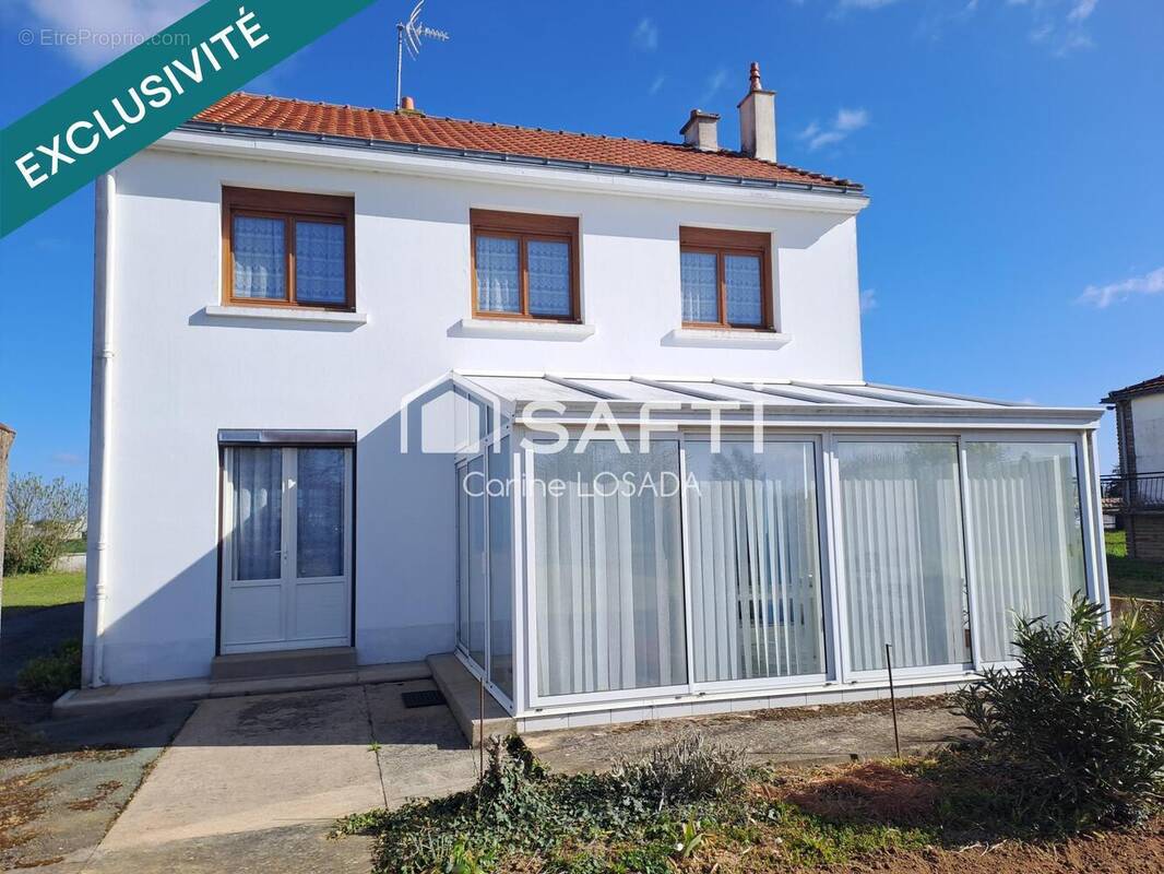 Photo 1 - Maison à LES MAGNILS-REIGNIERS