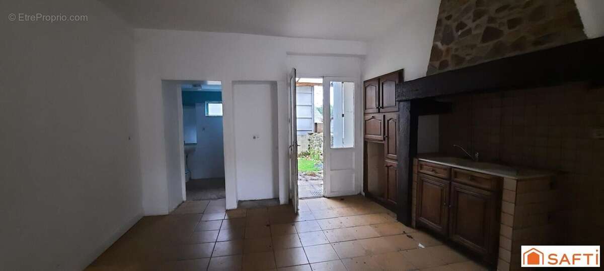 Photo 2 - Maison à LUBERSAC