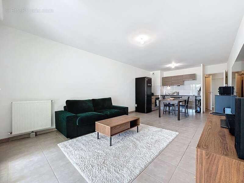 Appartement à vendre 2ème étage avec ascenseur, 3 pièces - 61 m2 + terrasse 11,30 m2 + parking couvert sécurisé - photo 2