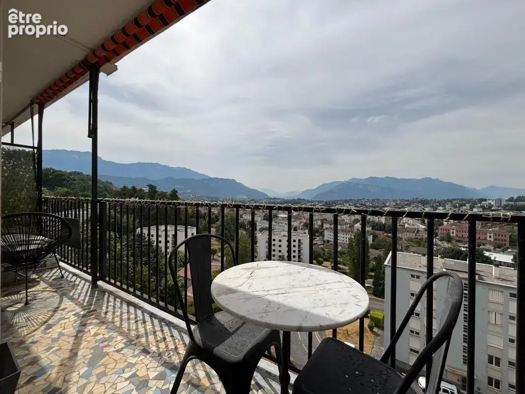 Appartement T4 de 75 avec balcon et cave - photo 2