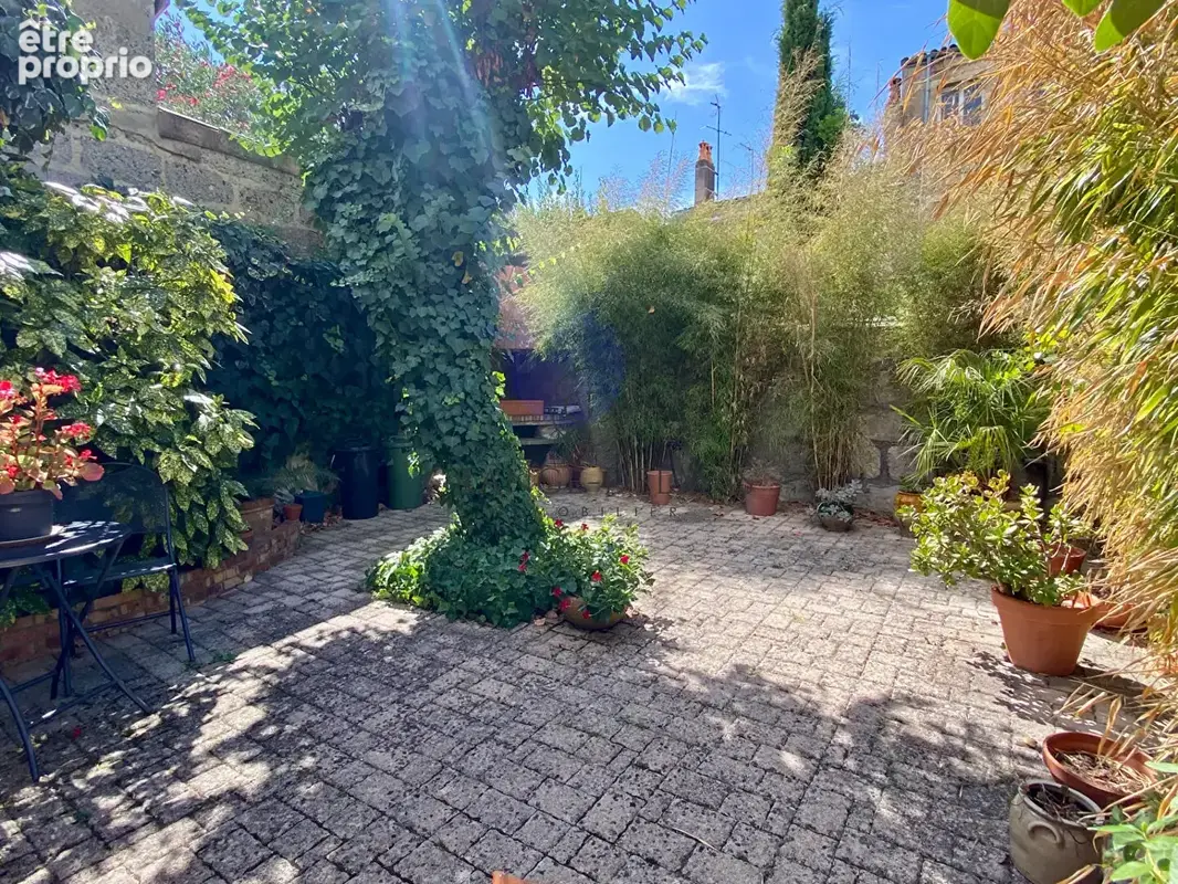 Maison en pierre en R+1 avec 3 chambres et jardin - SAINT SEURIN - photo 11