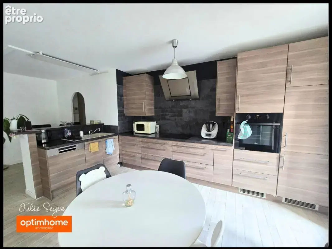 T3 Cessy centre en rez-de-jardin avec terrasse de 57 m², garage, cave et parking - photo 3