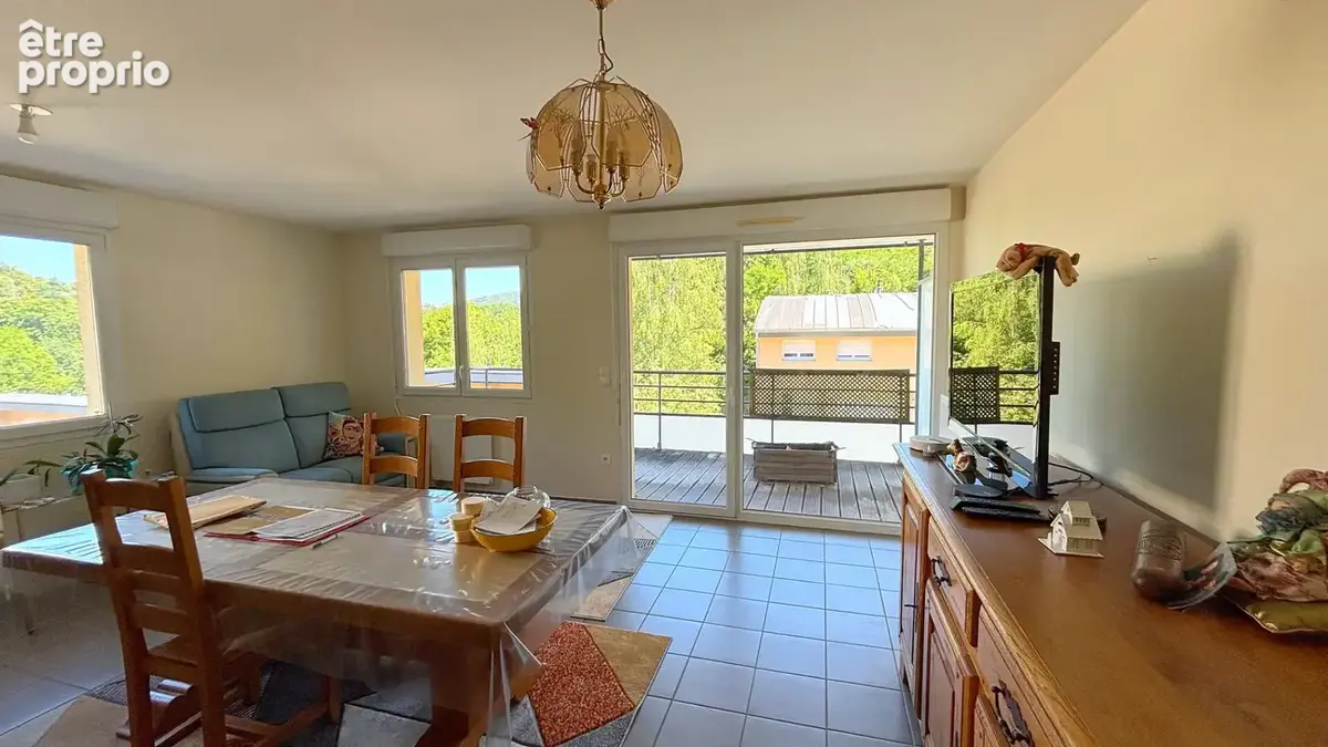 Appartement 3 pièces à vendre à Besançon - Rez-de-chaussée avec terrasse et garage - photo 3
