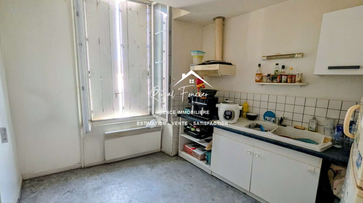 Appartement : Cuisine - Appartement à DANGE-SAINT-ROMAIN