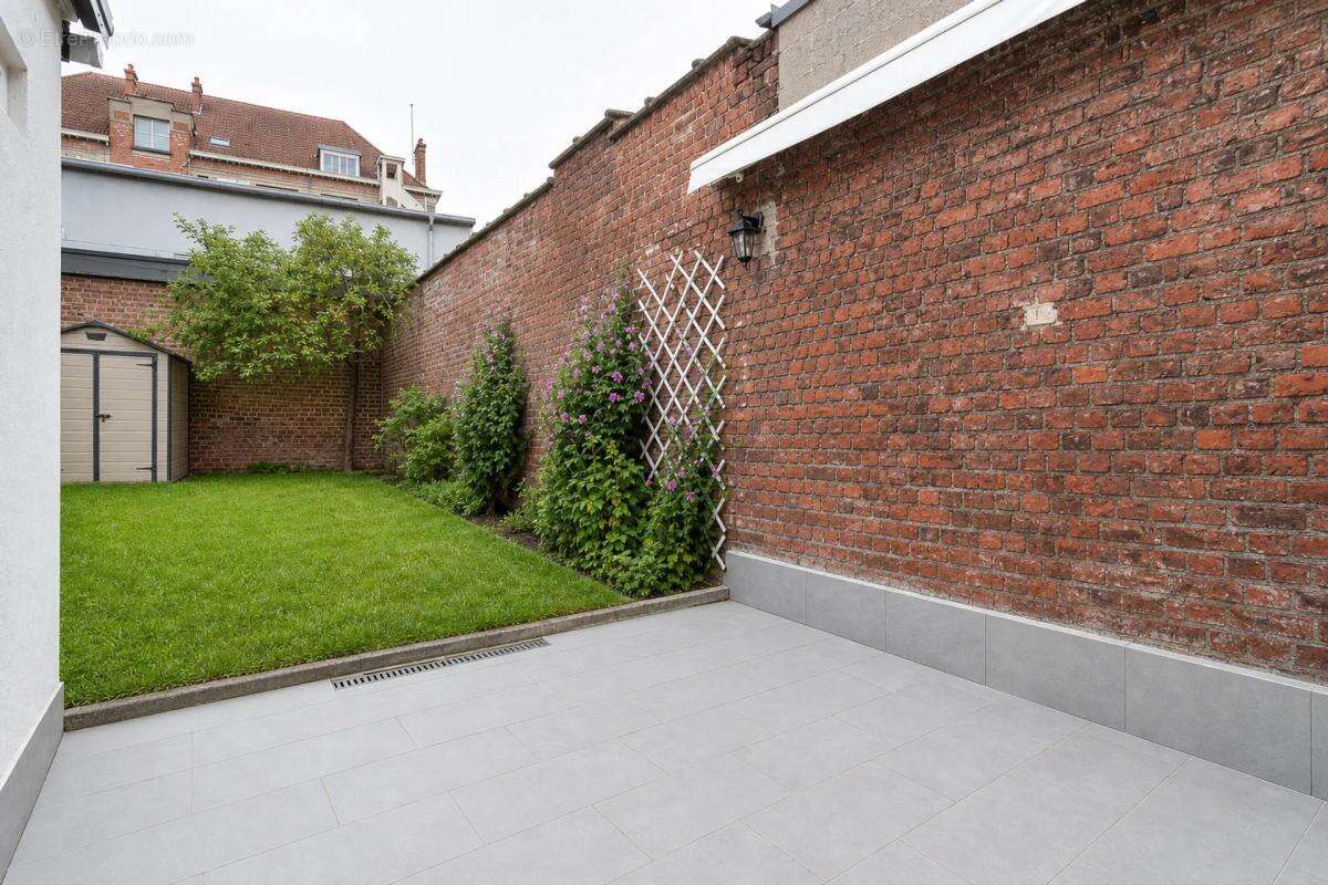 Maison de 6 pièces de 142 m² située à Tourcoing - photo 10