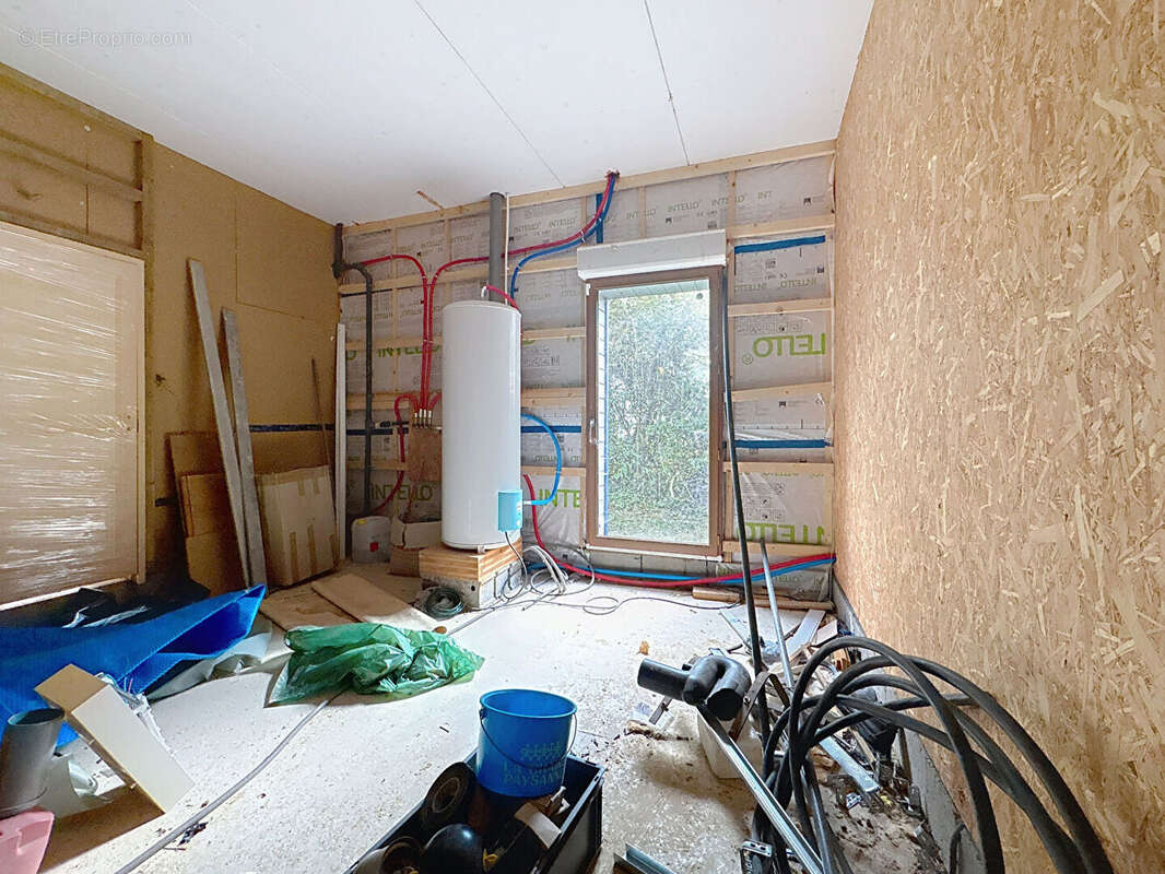 Grande maison à ossature et bardage bois - photo 8
