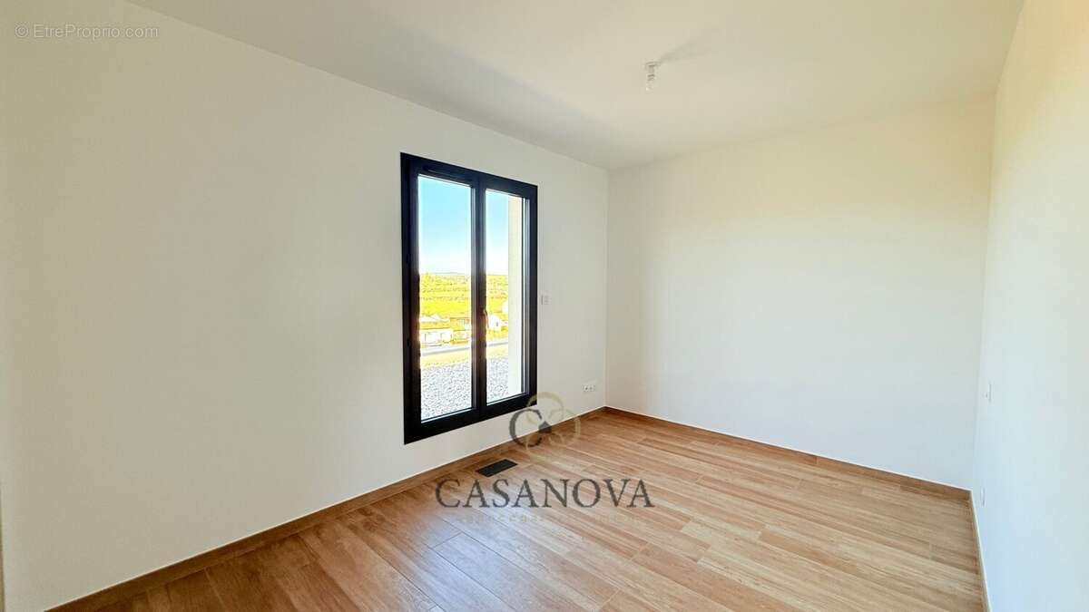 Villa contemporaine neuve avec piscine lagon et vue campagne à Magalas - photo 10