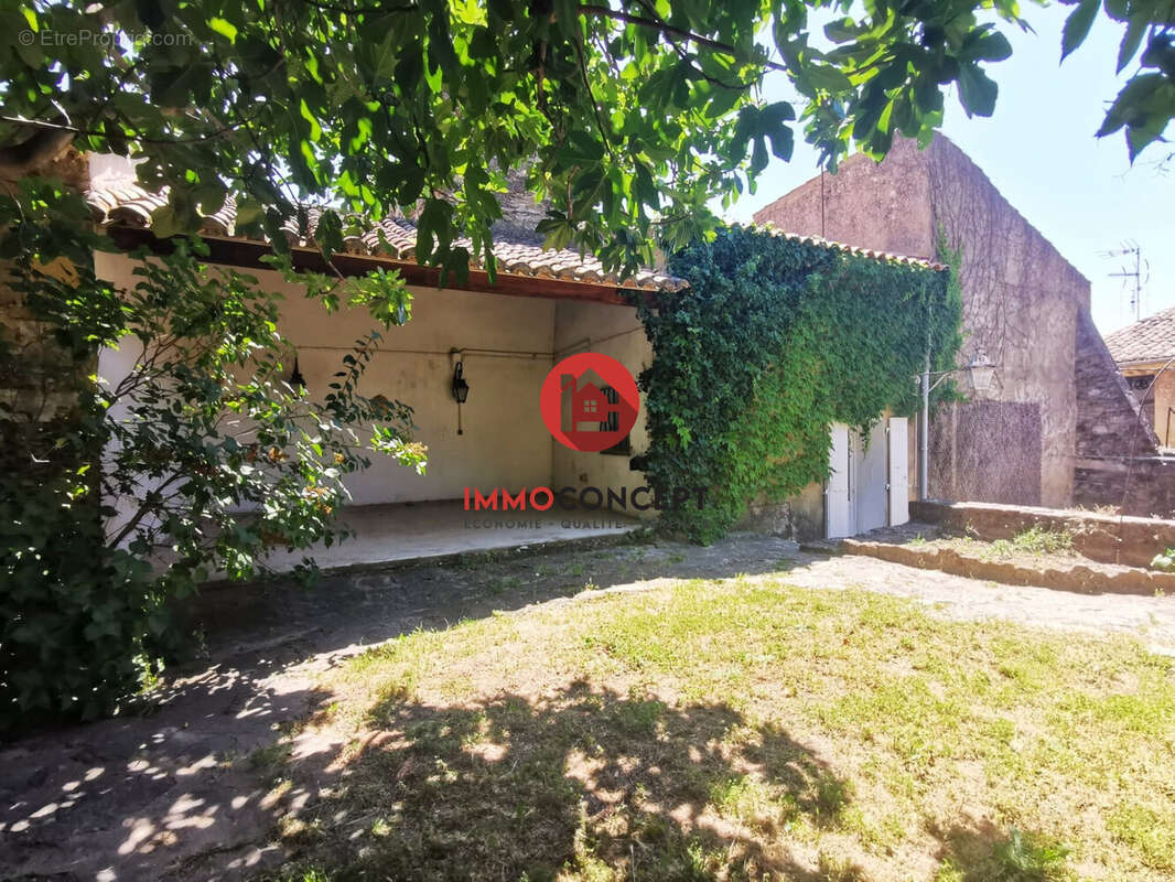 Maison à LAUDUN-L'ARDOISE