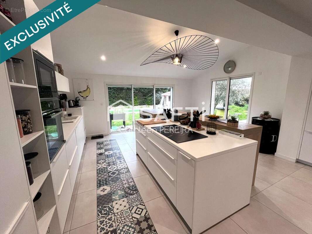 Photo 2 - Maison à SAINT-SULPICE