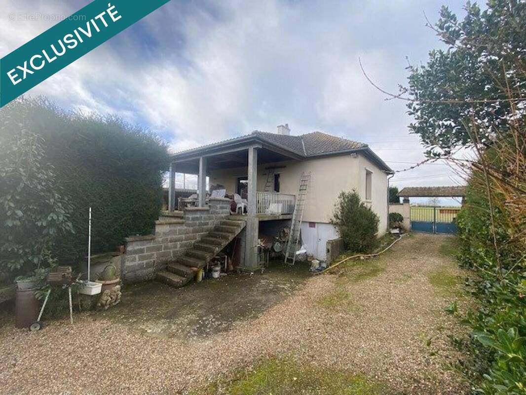 Photo 1 - Maison à ECAUVILLE