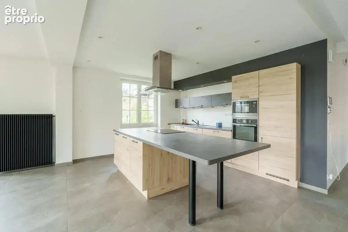 Vesoul – une maison familiale aux volumes exceptionnels - photo 5