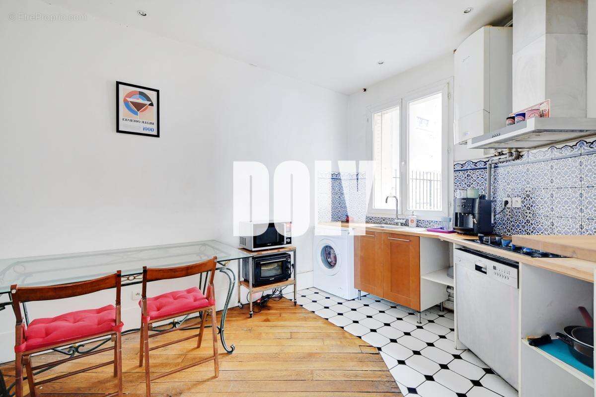 Doly- appartement - boulevard ornano - 75018 - photo 10