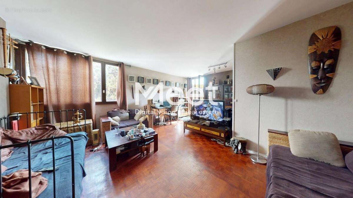 Appartement 4 pièces / 2 chambres - 70 m²  - cave - parking - photo 2