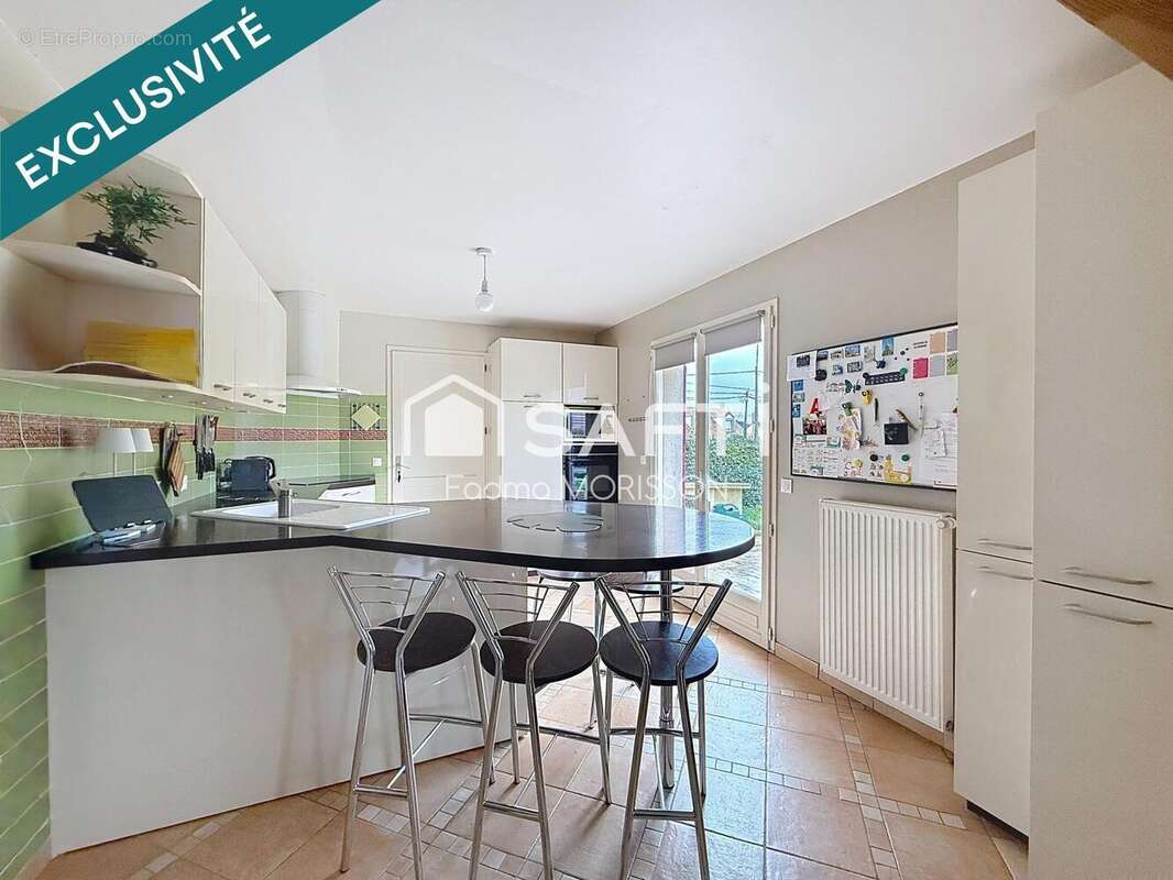 Photo 2 - Maison à CHANTELOUP-LES-VIGNES