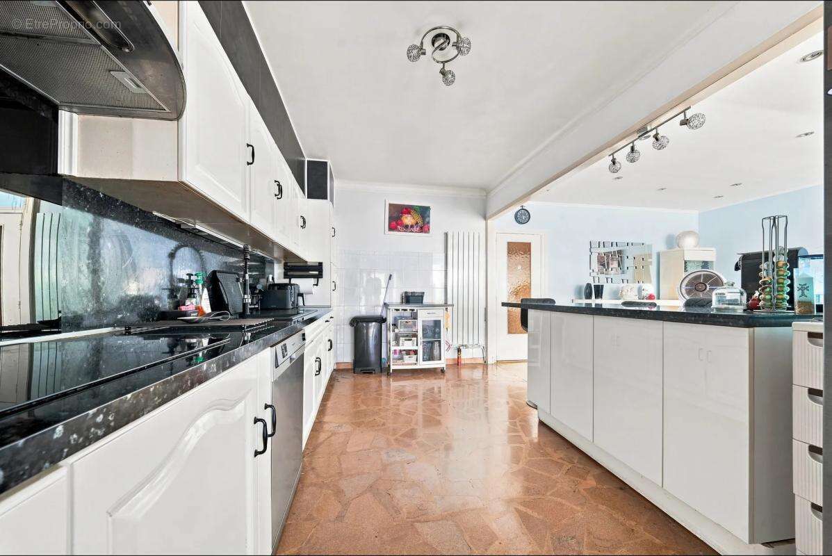 Maison de 5 pièces de 129 m² à Alfortville - photo 3