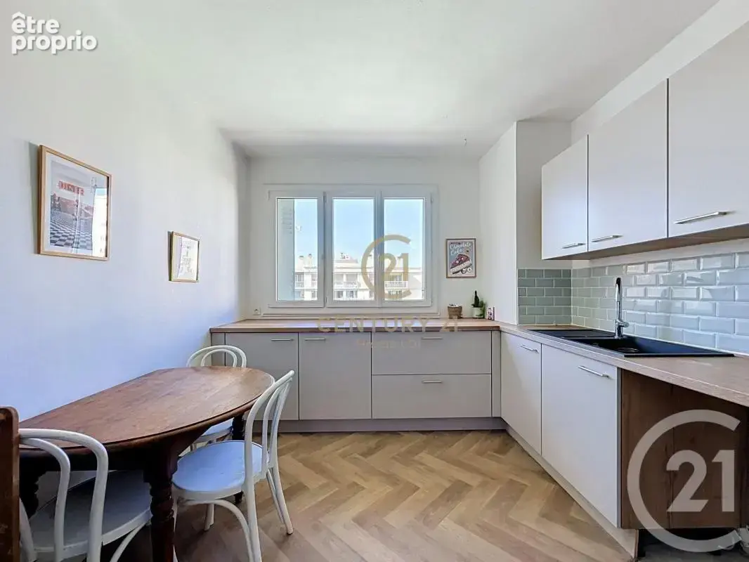 Appartement 4 pièces 99 m² à vendre à Lyon-8e (69008) - photo 5