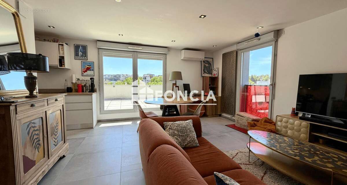 SEYNOD – Appartement T3 dernier étage avec terrasse de 35 m² plein sud et vue montagnes - photo 2