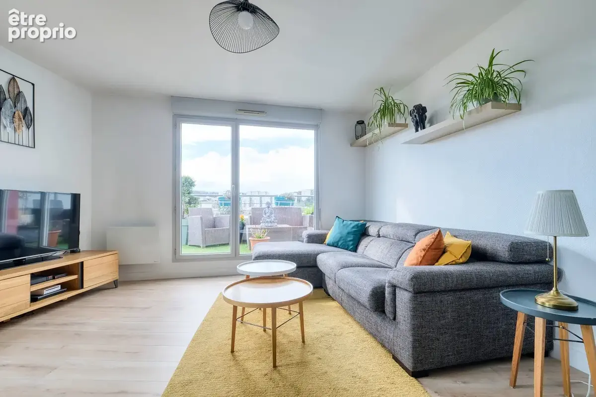 Appartement 3 pièces 57 m² à vendre à Grigny (69520) - photo 2