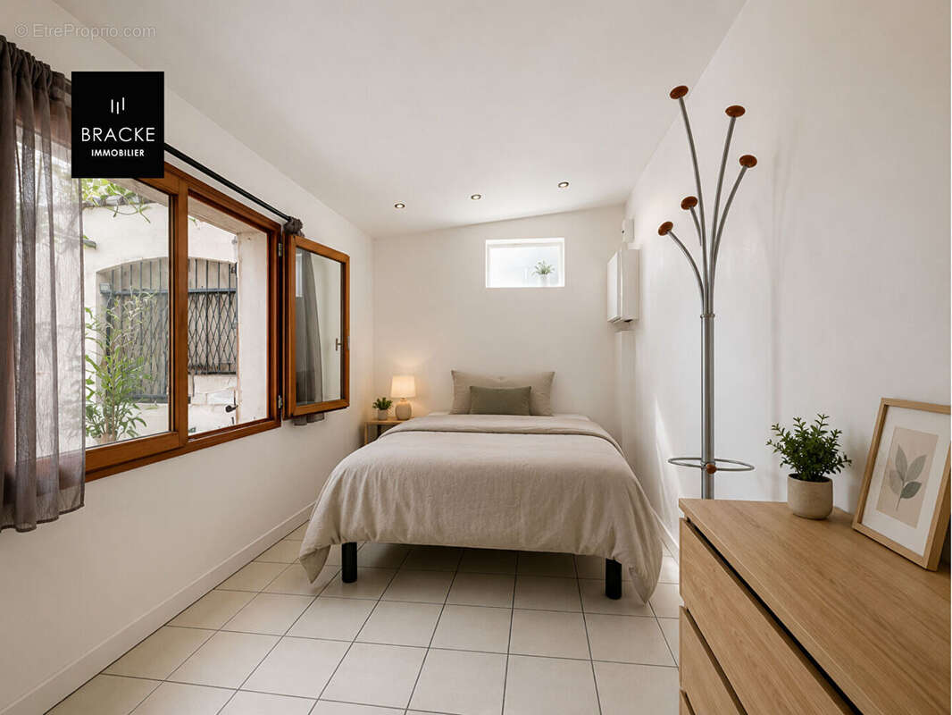 Asnières-sur-Seine -Maison de ville rénovée avec 3 chambres, patio et terrasse arborée - photo 8