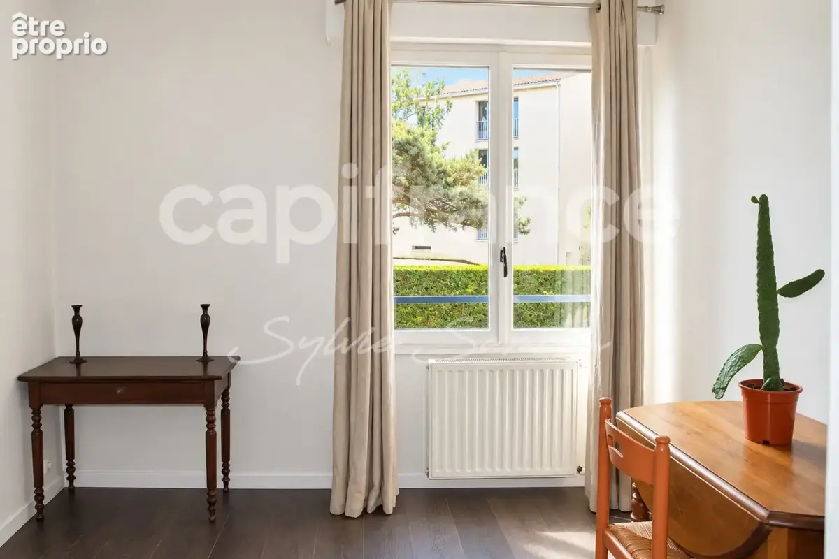 Mantes-la-Jolie – Appartement T3 traversant de 61 m² avec parking, cave et séchoir - photo 9