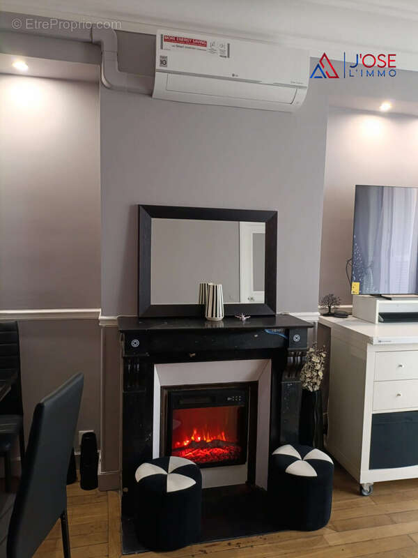 Cheminée et climatisation réversible - Appartement à PARIS-19E