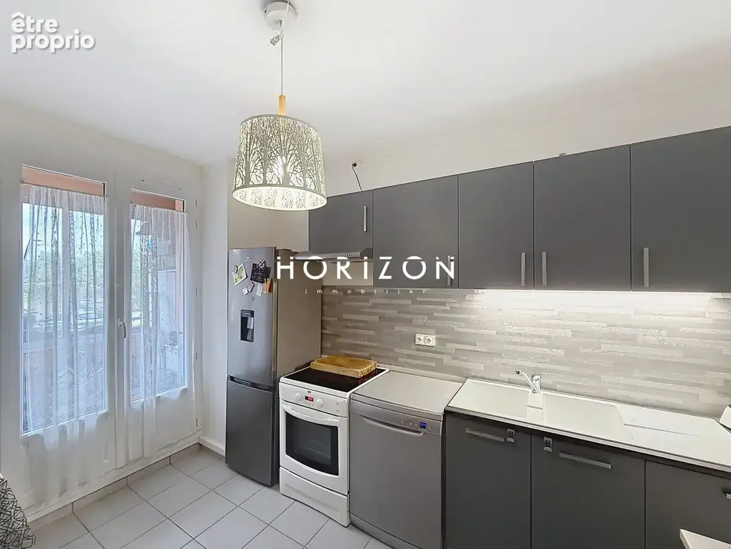 Appartement 3 pièces 56 m² à vendre à Venissieux (69200) - photo 4