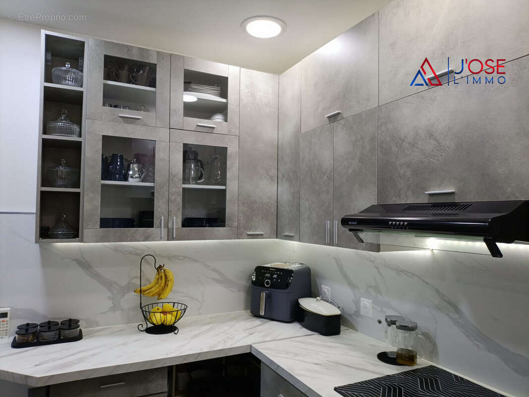 Cuisine moderne et entièrement équipée - Appartement à PARIS-19E