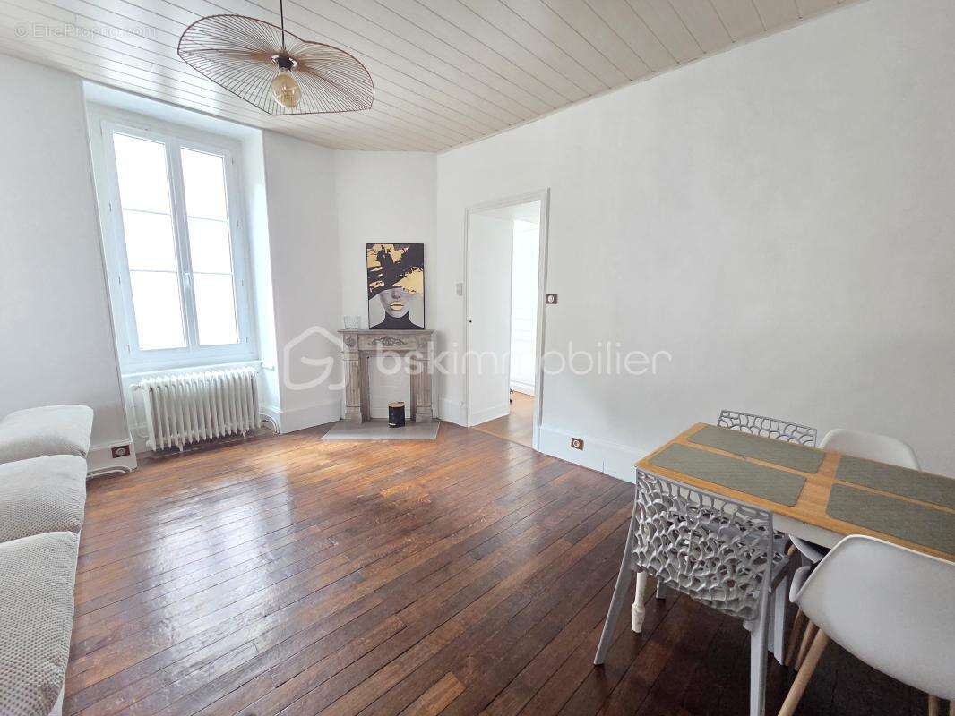 Magnifique appartement T3 de 101m² avec place de parking privative et cave en hypercentre ville de Nevers - photo 10