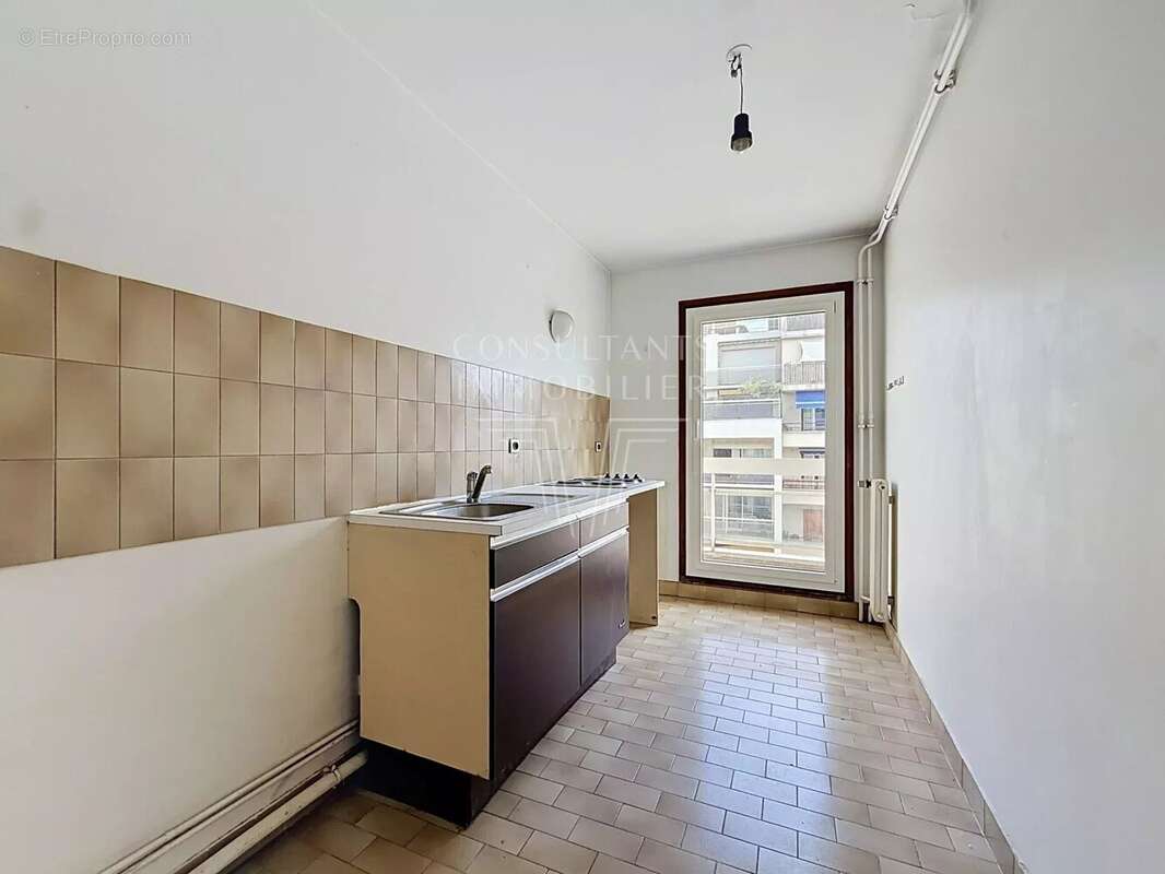 Deux-pièces en étage élevé avec balcon - photo 5
