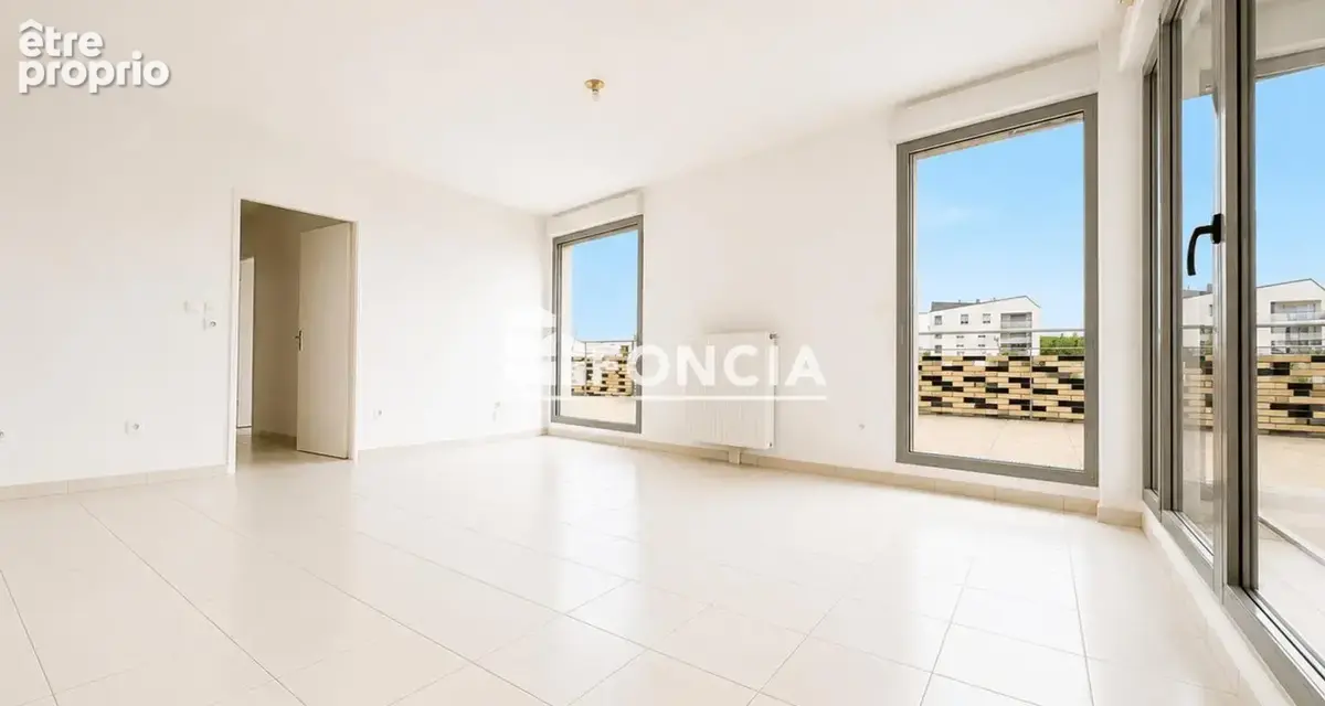 Appartement t3 avec grande terrasse privative et deux places de parkings privees en sous-sol - photo 3